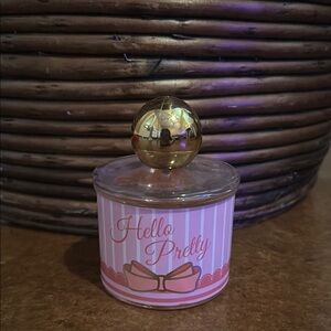 Pink and Gold Moisturizer with Cylindrical Design